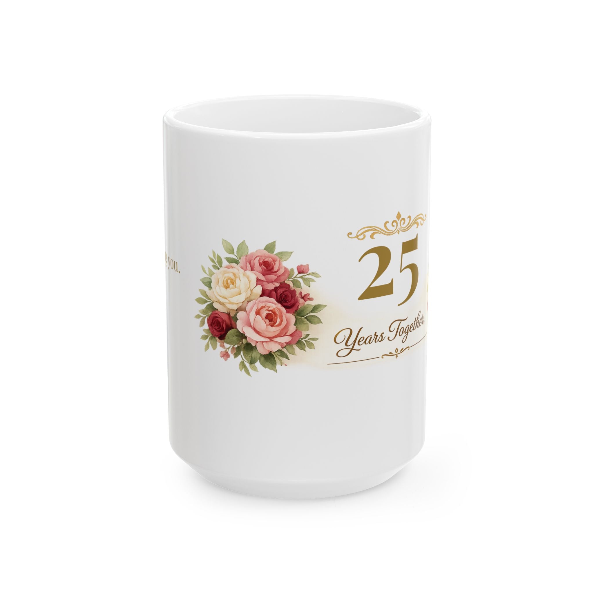 Close-up of gold accents and rose bouquet on the anniversary mug