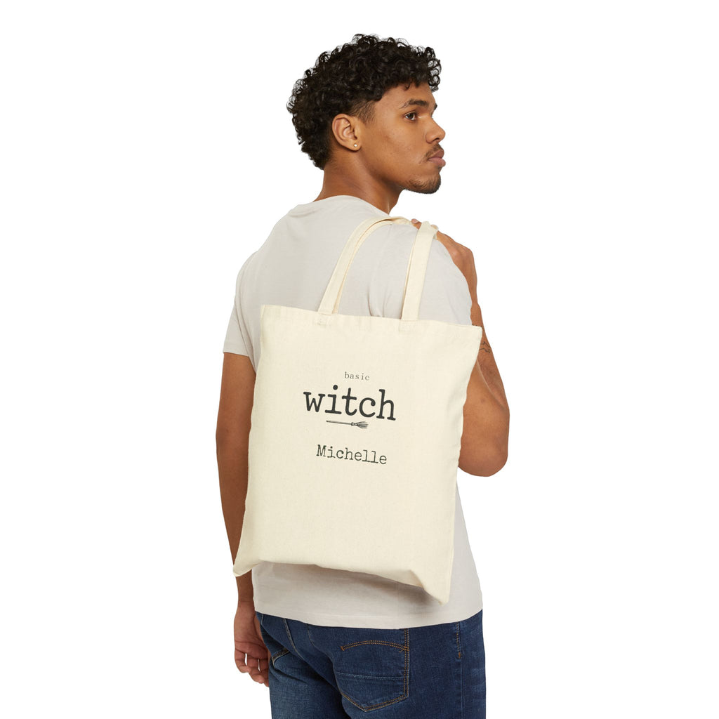 Close-up of Basic Witch broom design and custom name print on canvas tote