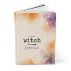 Close-up of the Basic Witch journal cover showing broomstick detail and personalized name