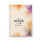Basic Witch personalized journal open flat showing broomstick illustration and custom name