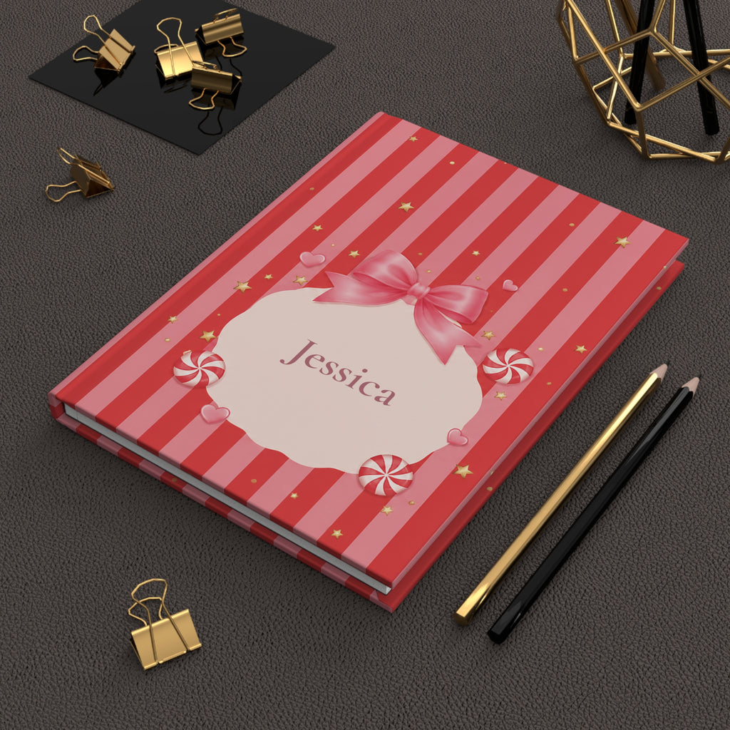 Open Candy Cane journal showing blank lined pages inside