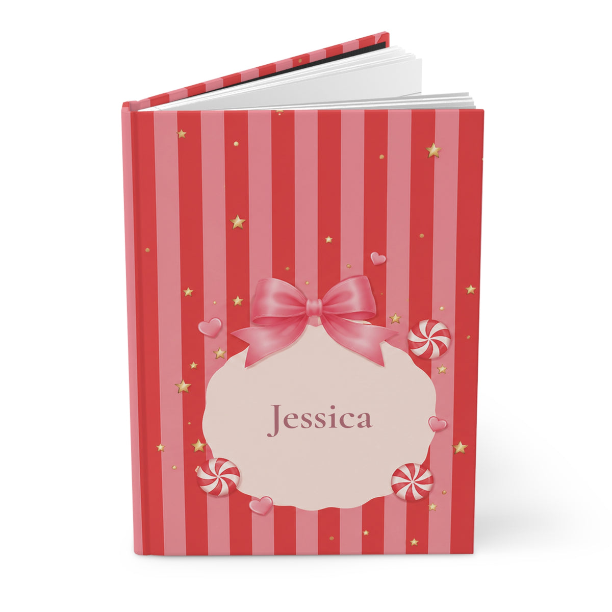 Close-up of the Candy Cane journal cover showing bow and peppermint illustration and personalized name