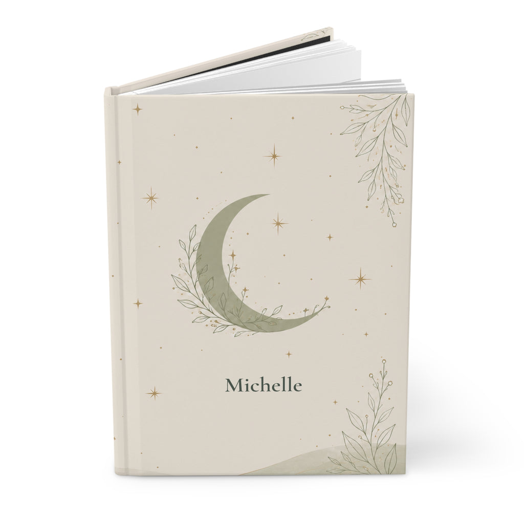 Close-up of the Celestial Moon journal cover showing botanical moon illustration and personalized name
