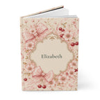 Close-up of the Cherry Blossom journal cover showing floral bow illustration and personalized name