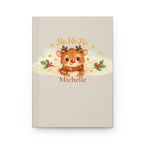 Ho Ho Ho personalized journal open flat showing custom name on cover with cute reindeer illustration