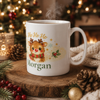 Ho Ho Ho reindeer mug displayed on a table with holiday decor