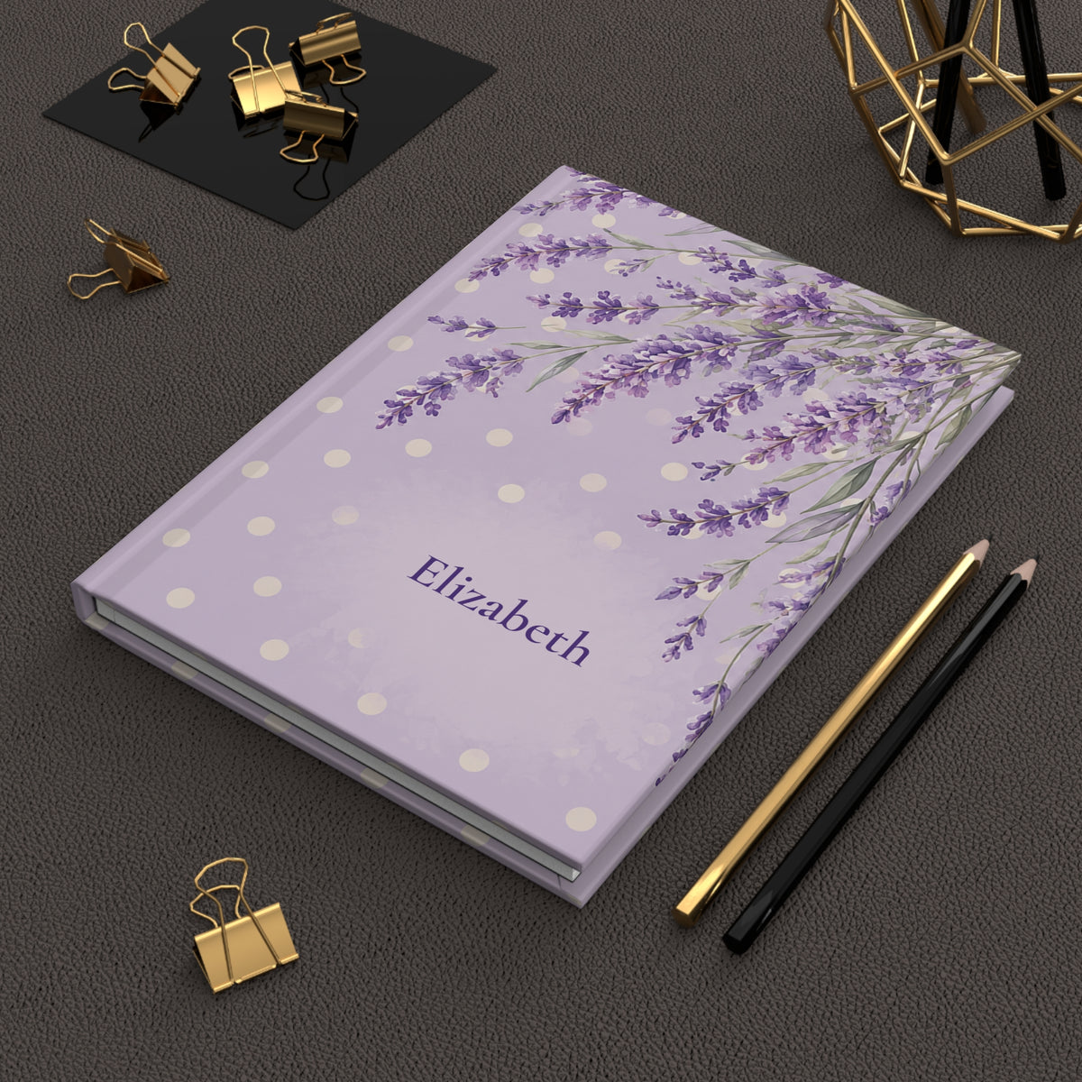 Lavender Fields journal held in hand to show size and portability