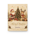 Merry Christmas personalized journal open flat showing custom name on cover with vintage Santa and cabin scene