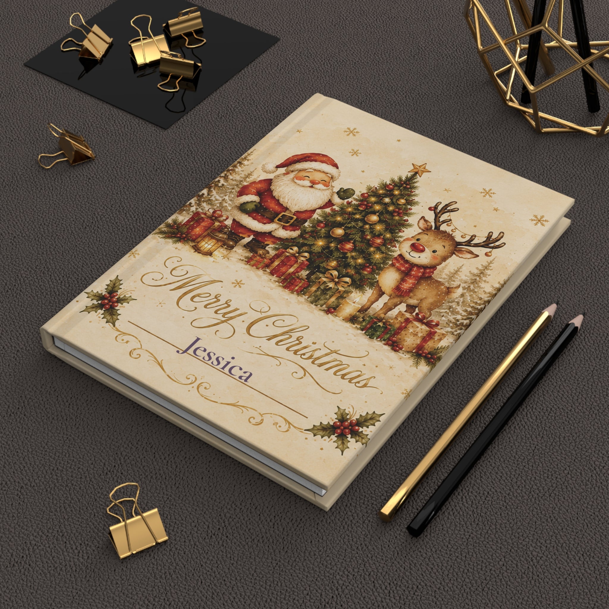 Merry Christmas journal held in hand to show size and portability