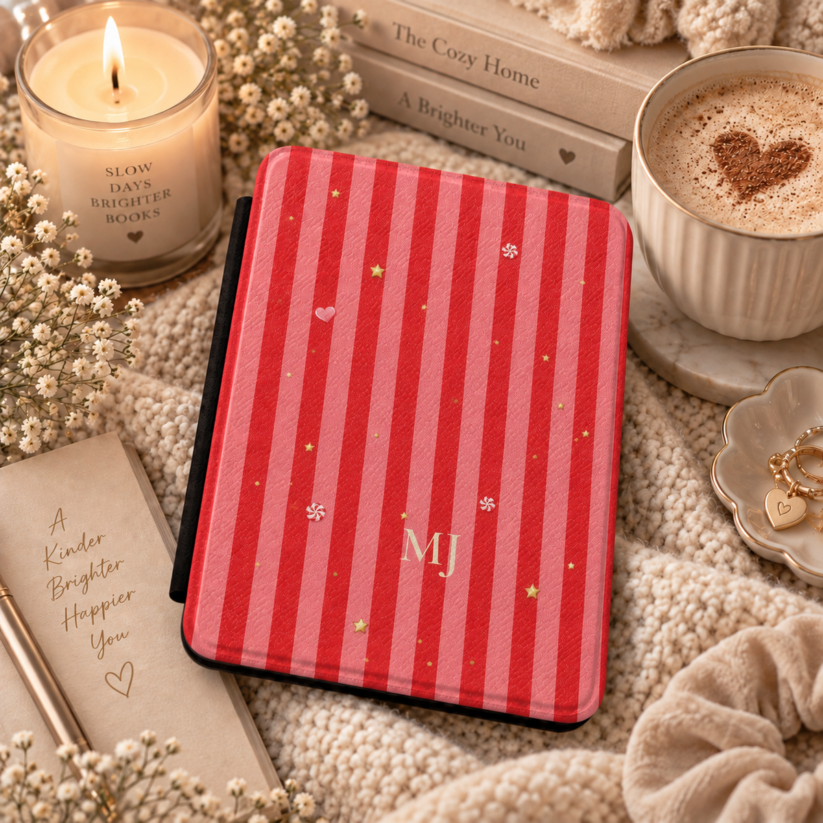 Monogram candy stripe Kindle case open showing soft fabric interior lining