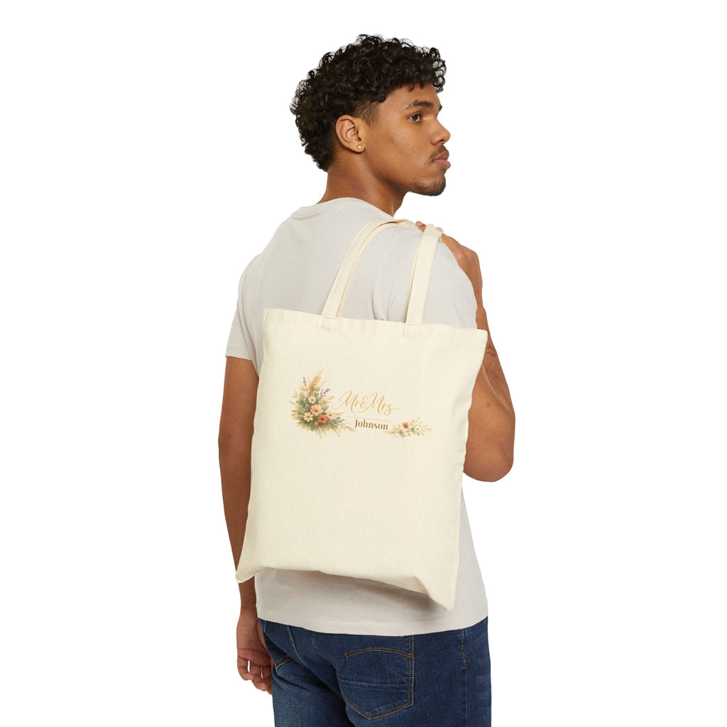 Close-up of Mr and Mrs wildflower design and custom surname print on canvas tote