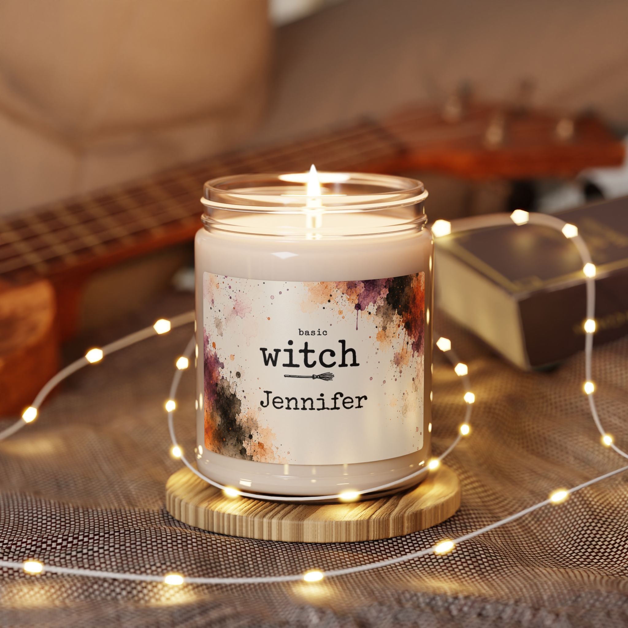 Personalized Halloween candle displayed in a cozy living room setting