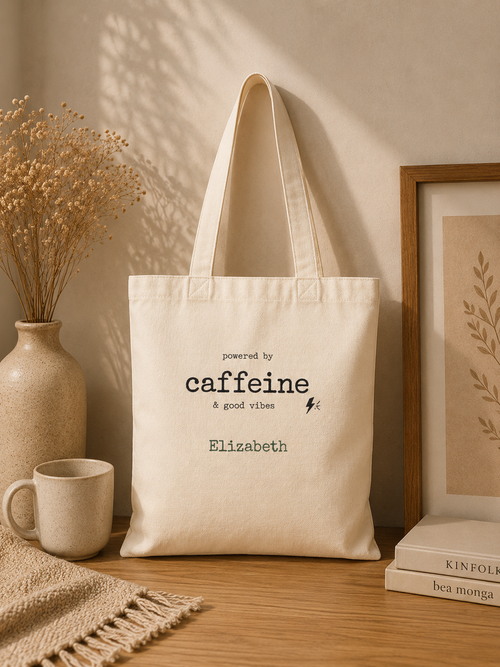 Caffeine and Good Vibes personalized tote carried over the shoulder, lifestyle shot