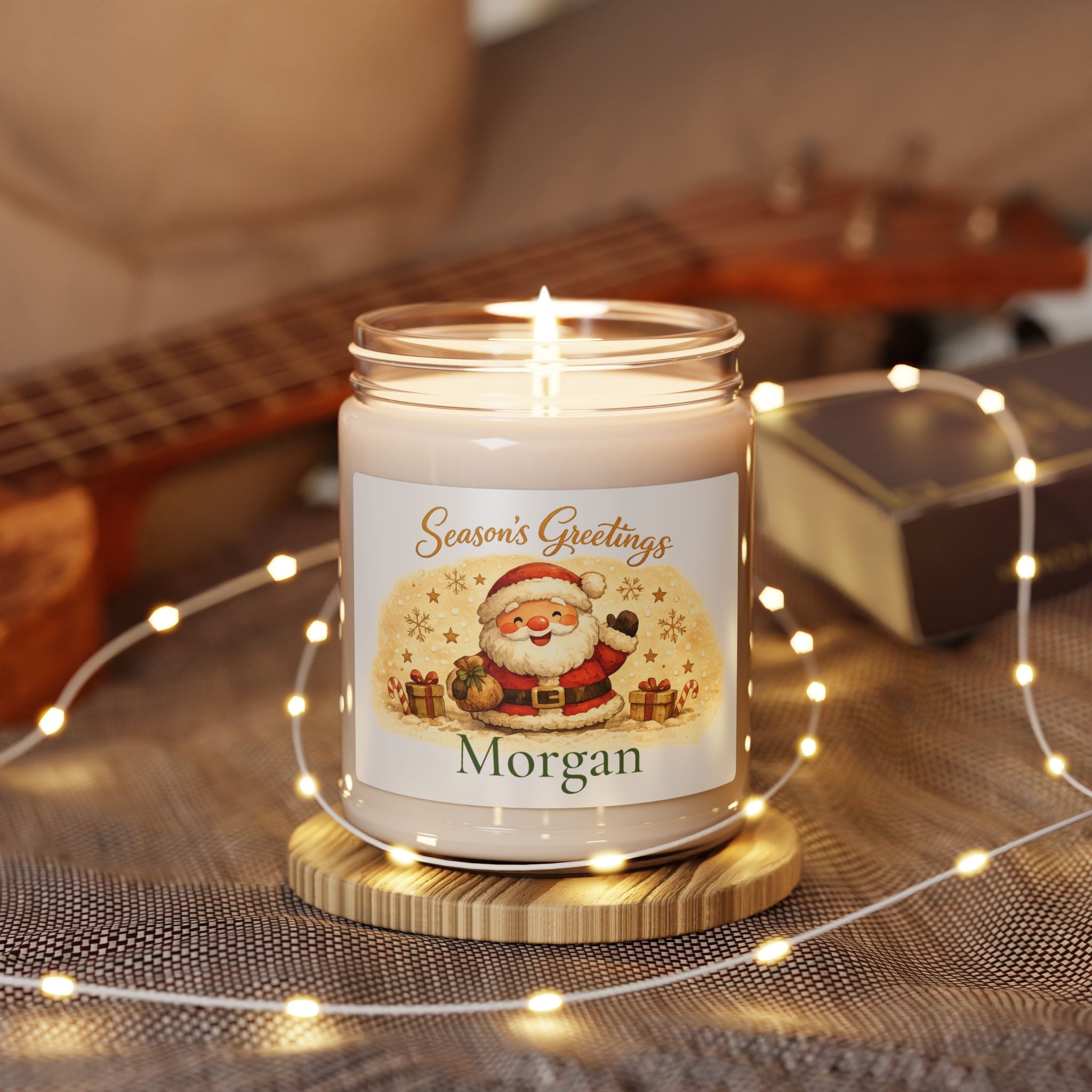 Personalized Christmas candle displayed in a cozy living room setting