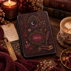 Close-up of the crystal and quill illustration on the dark academia Kindle case