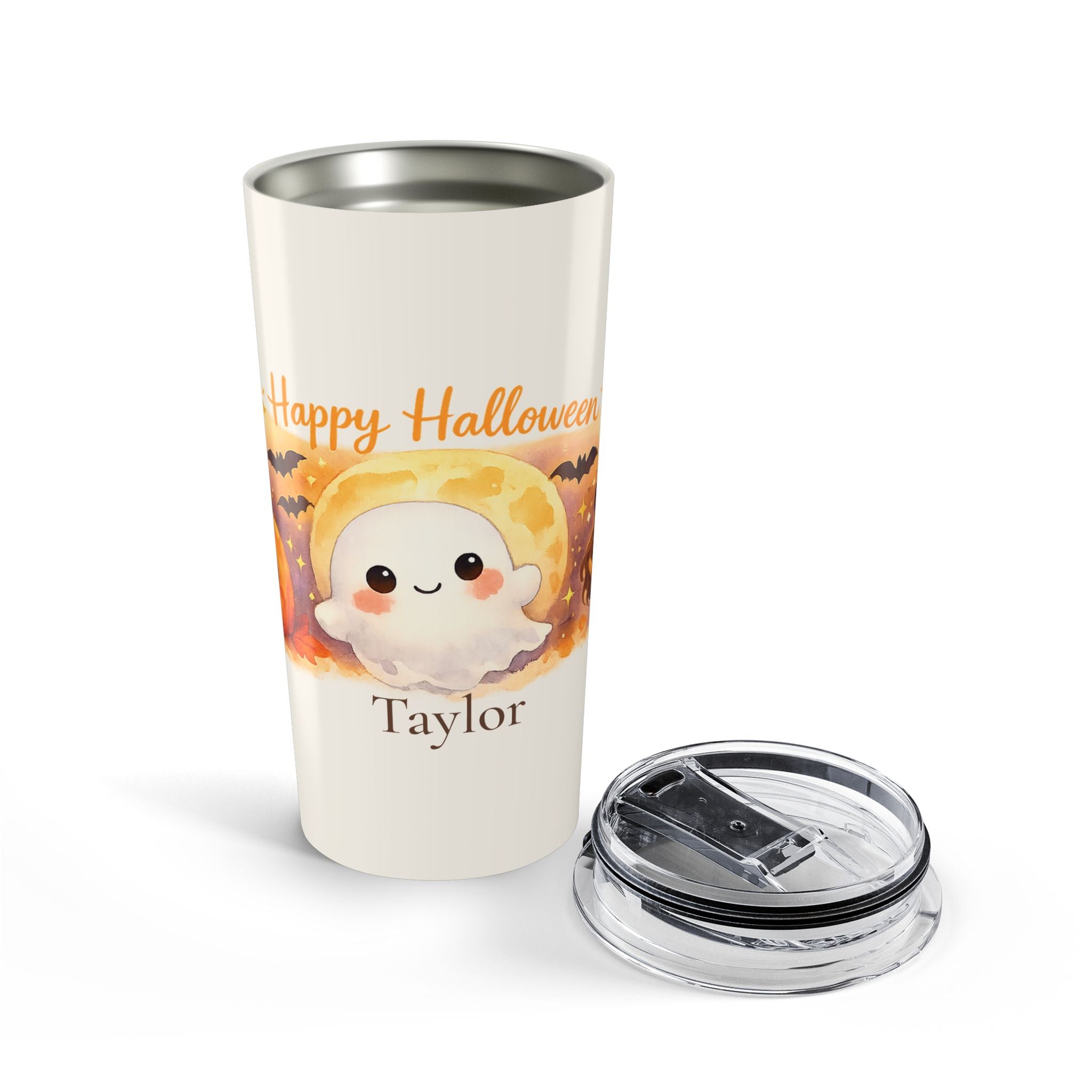 Happy Halloween ghost tumbler styled with fall decor on a table