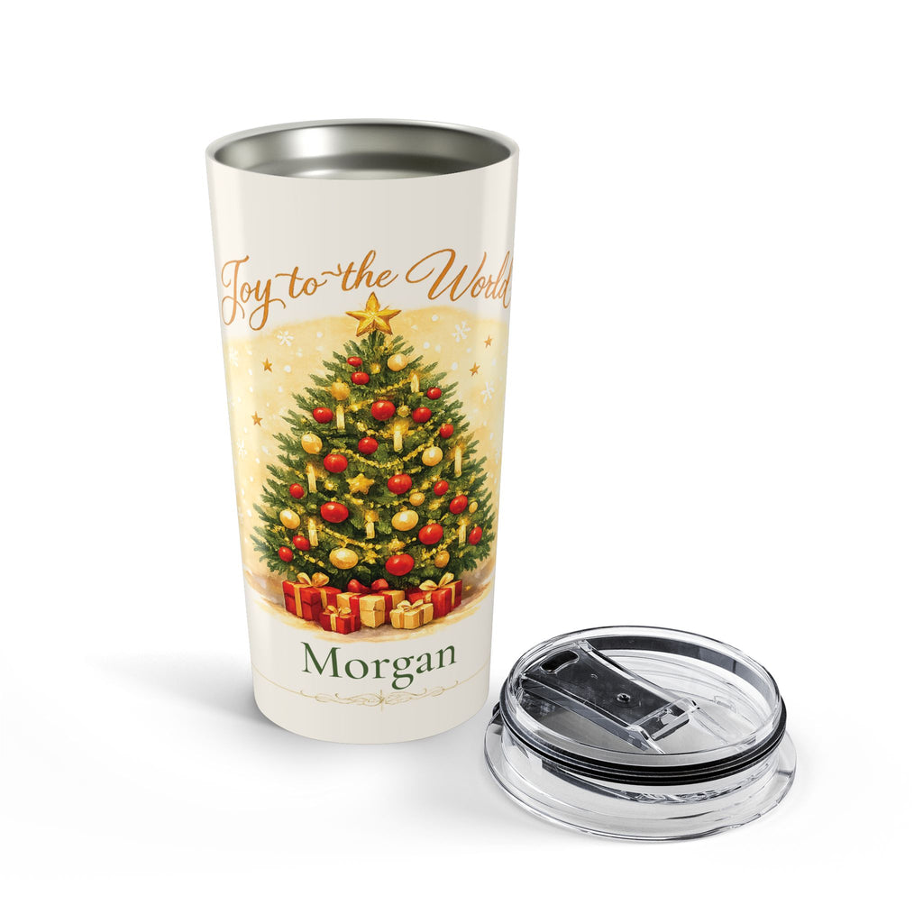 Joy to the World Christmas tumbler styled with holiday decor on a table