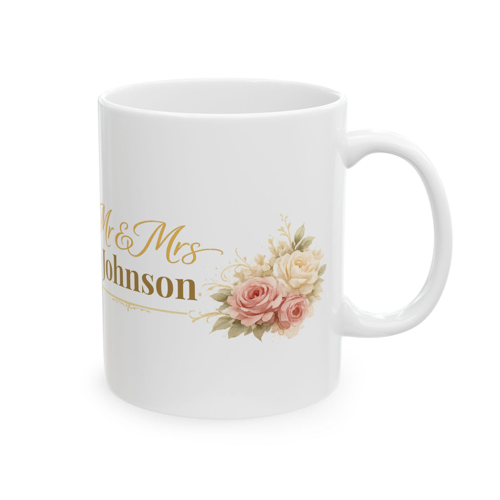 White ceramic mug with gold Mr and Mrs Johnson script and a blush pink rose bouquet