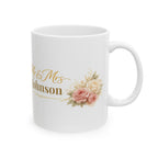 White ceramic mug with gold Mr and Mrs Johnson script and a blush pink rose bouquet