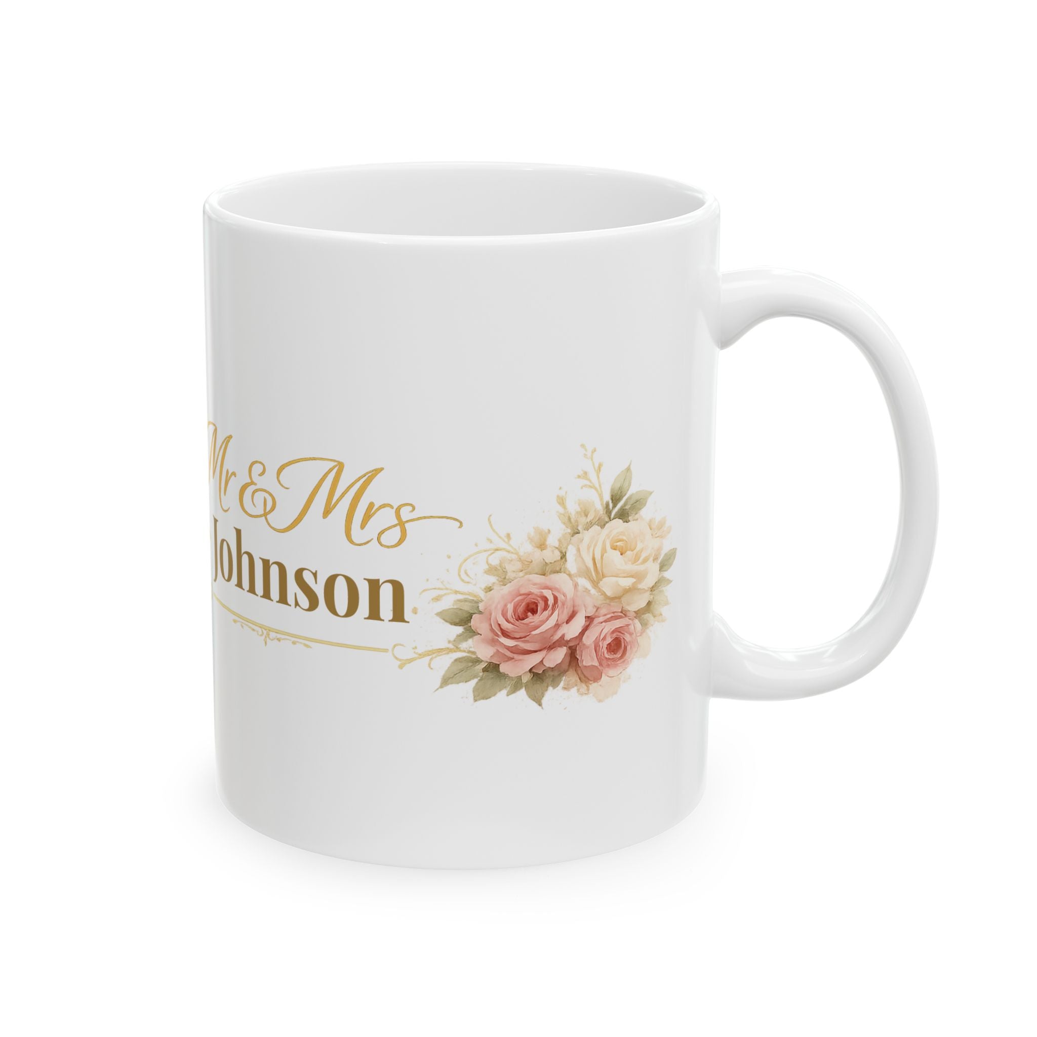 White ceramic mug with gold Mr and Mrs Johnson script and a blush pink rose bouquet