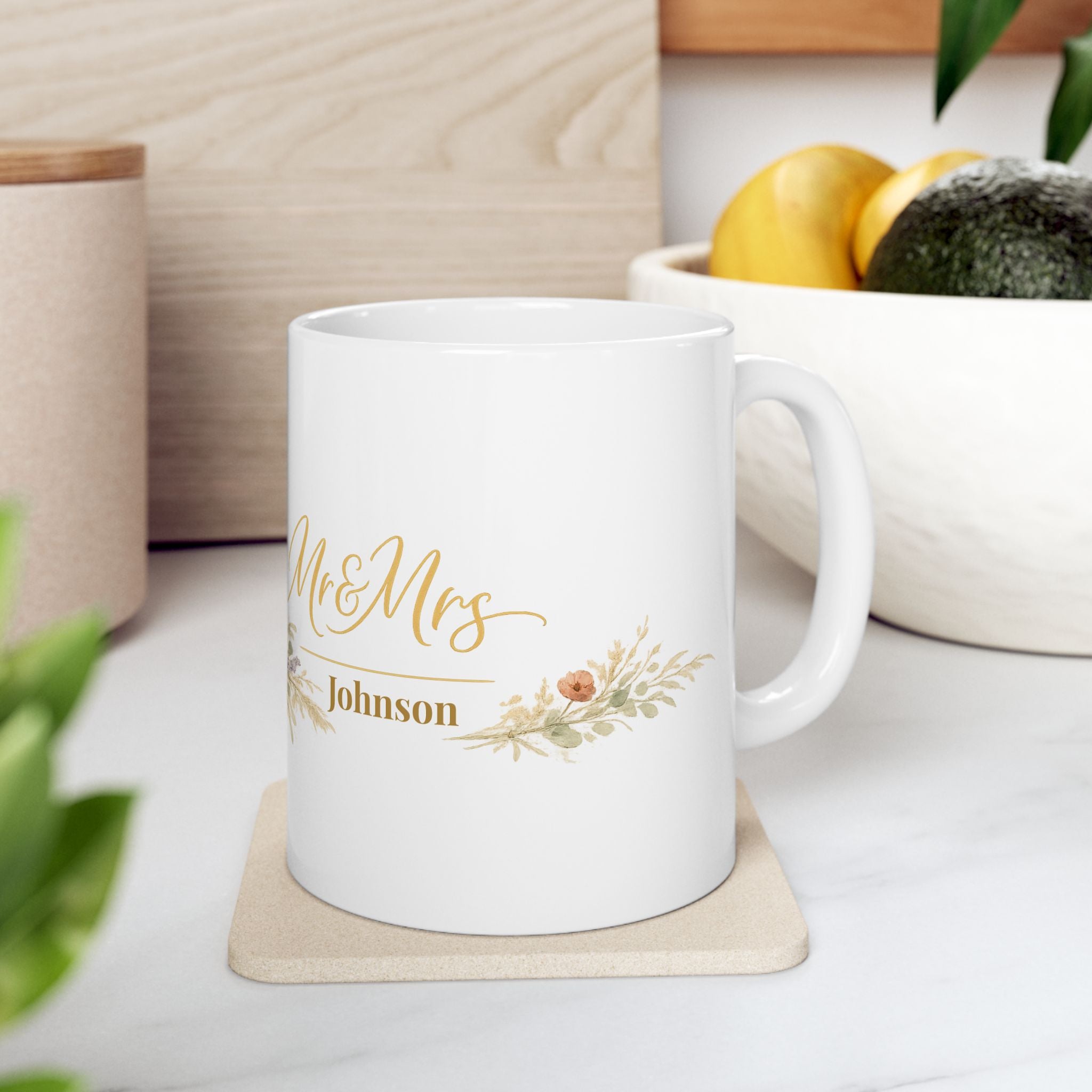 Close-up of the wildflower and wheat sprig design on the personalized mug