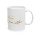 White ceramic mug with gold Mr and Mrs Johnson script and rustic wildflower sprigs