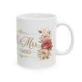 White ceramic mug with gold Mr and Mrs script, rose bouquet, and personalized wedding year