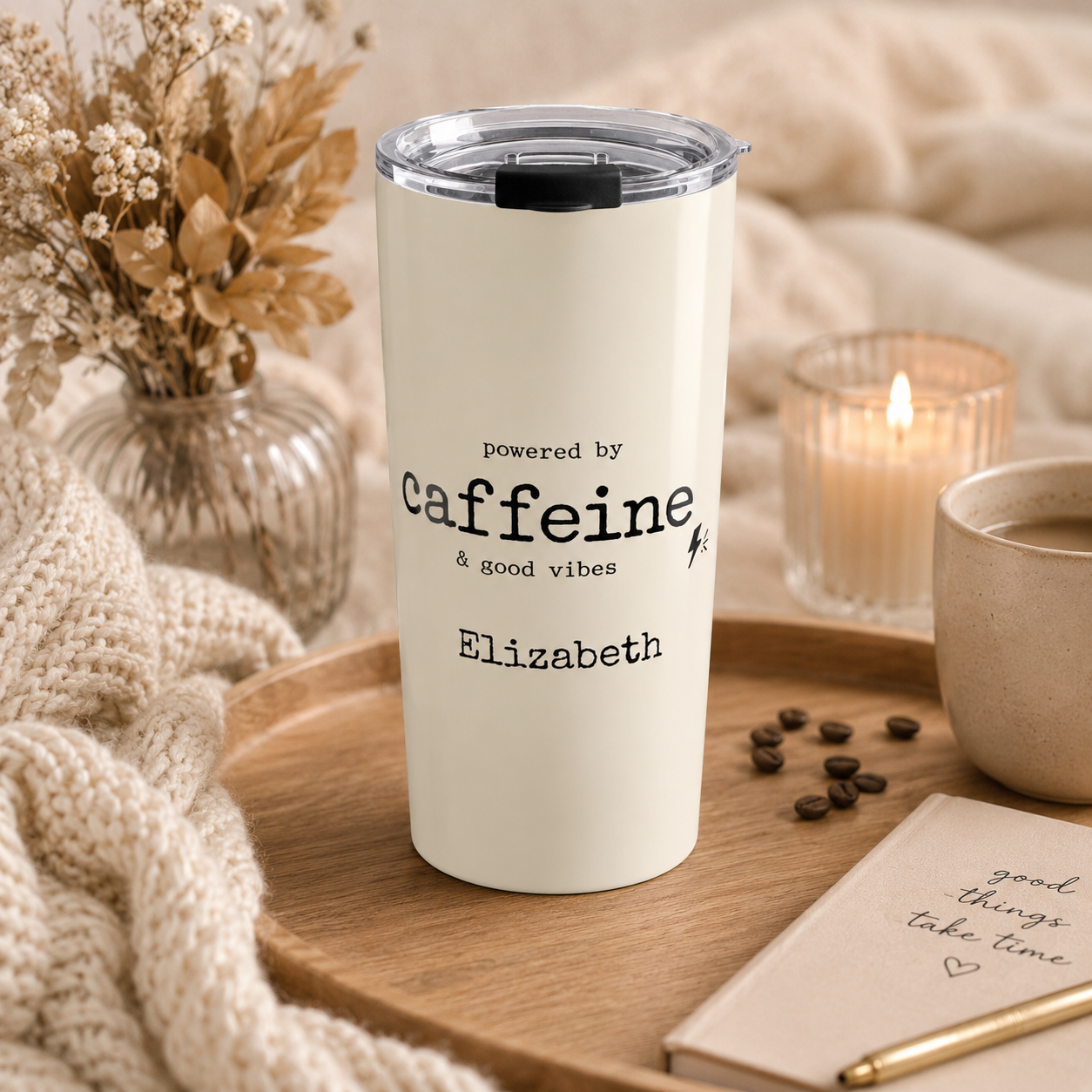 Close-up of custom name personalization on Powered by Caffeine tumbler
