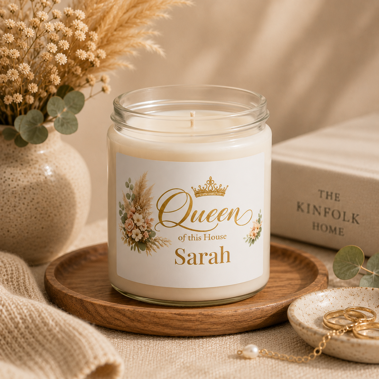 Personalized Queen of the House candle shown on a vanity as part of home decor