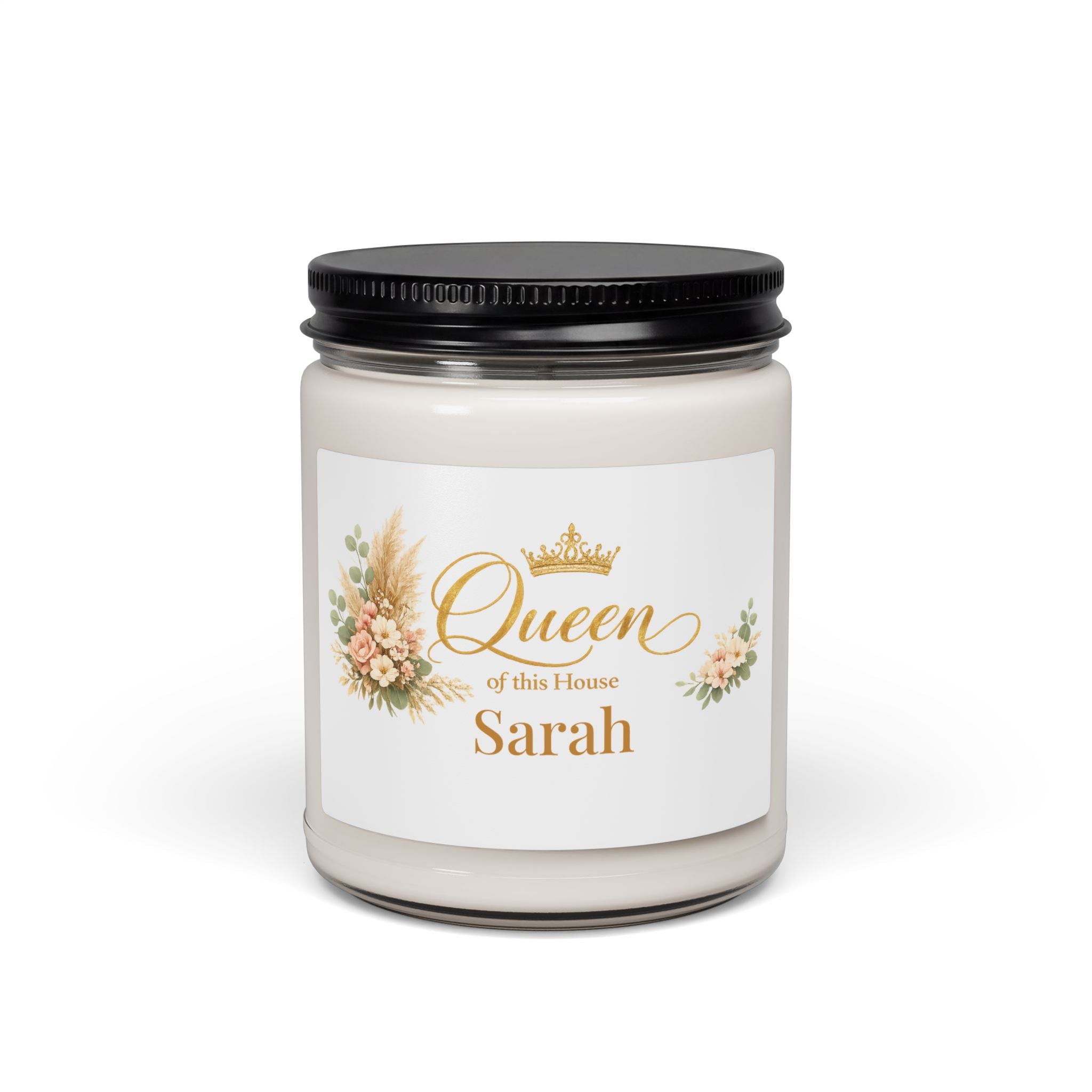 Personalized Queen of this House soy candle with gold crown and florals and the name Sarah