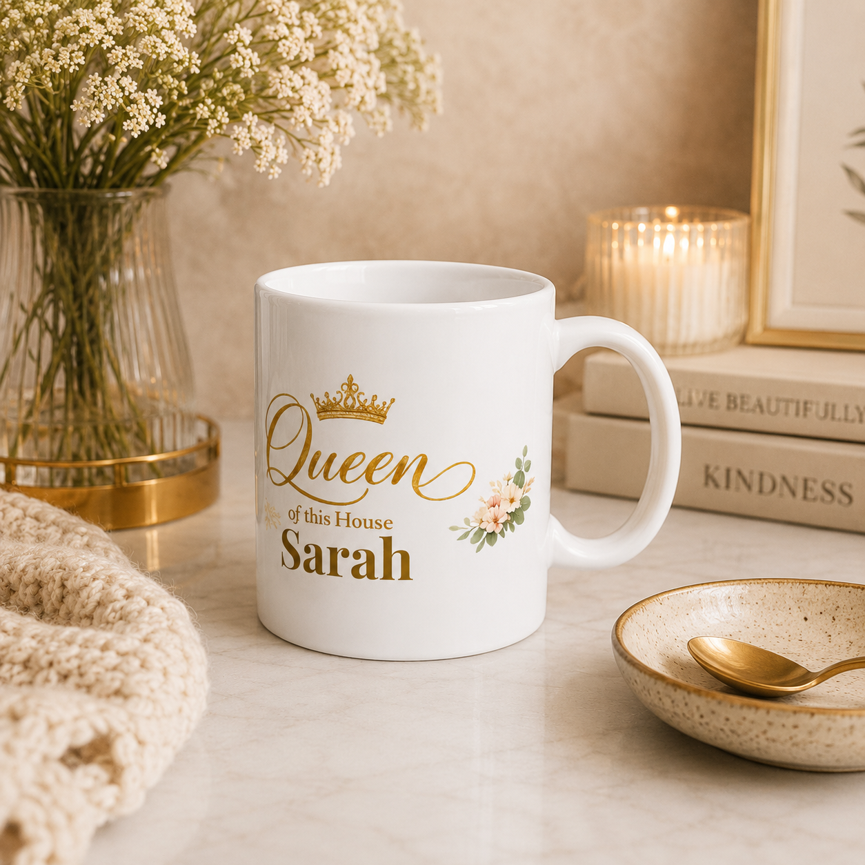 Close-up of the gold crown and blush floral design on the personalized mug