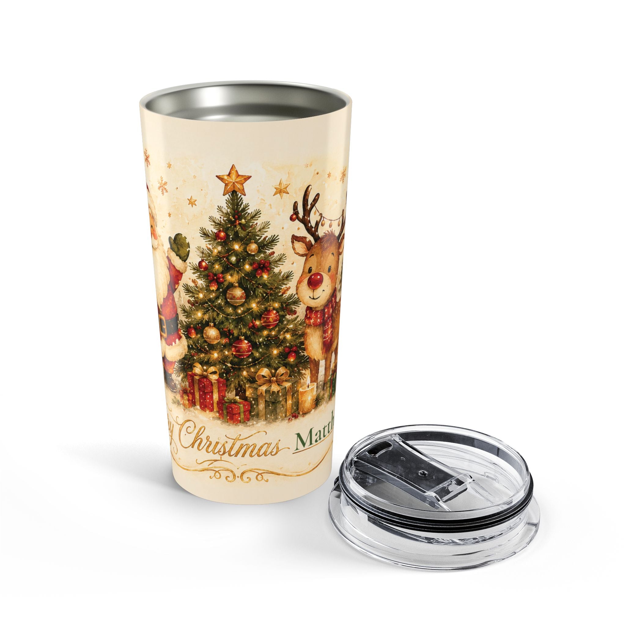 Santa and reindeer Christmas tumbler styled with holiday decor on a table