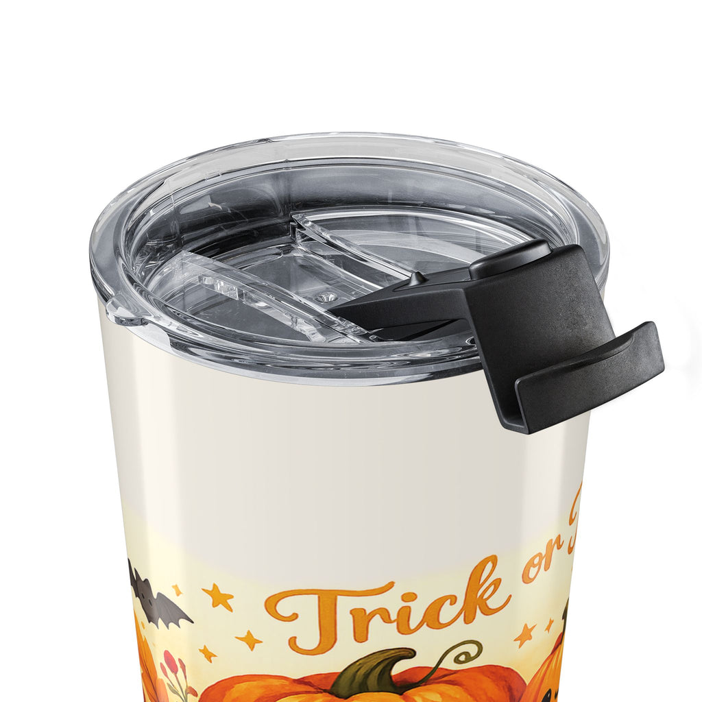 Trick or Treat pumpkin tumbler held in hand showing size and grip