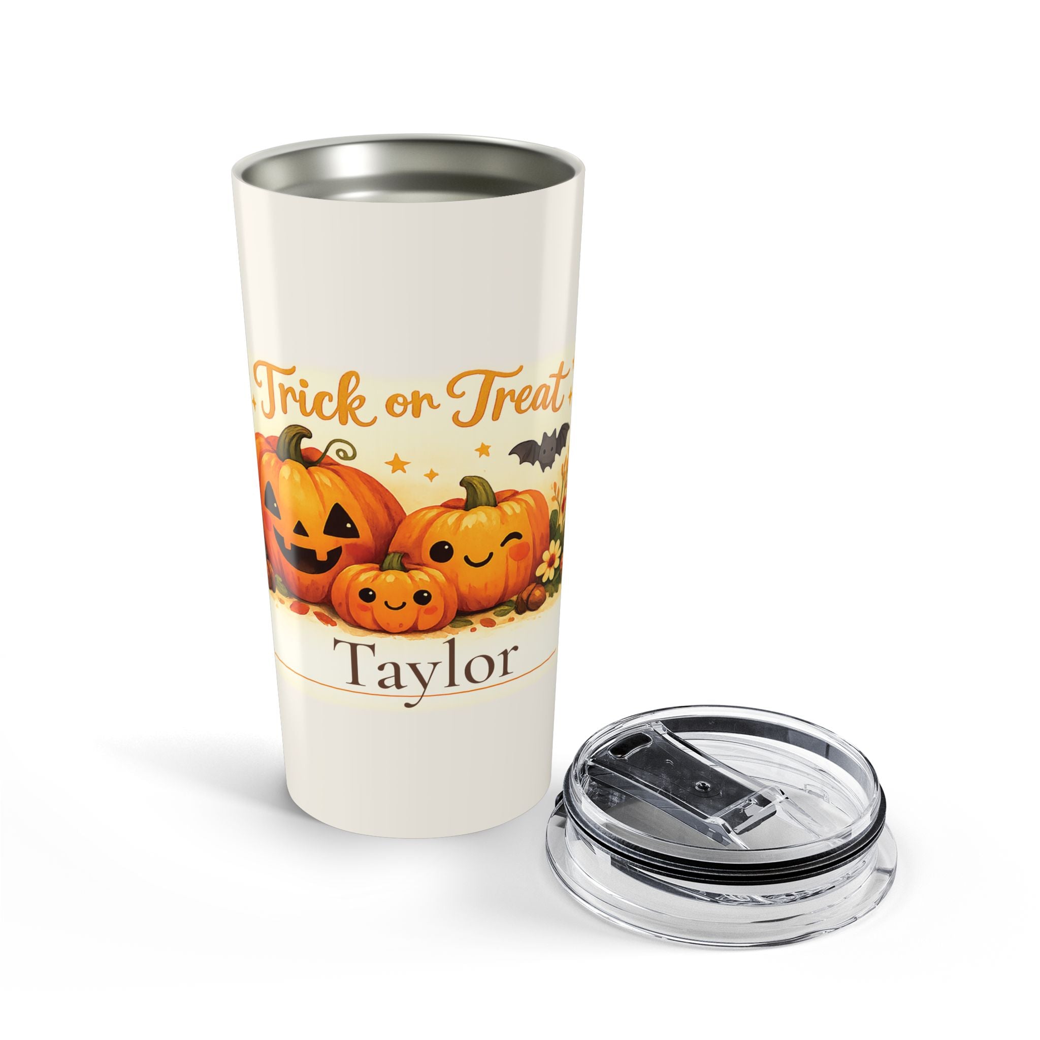 Trick or Treat pumpkin tumbler styled with fall decor on a table