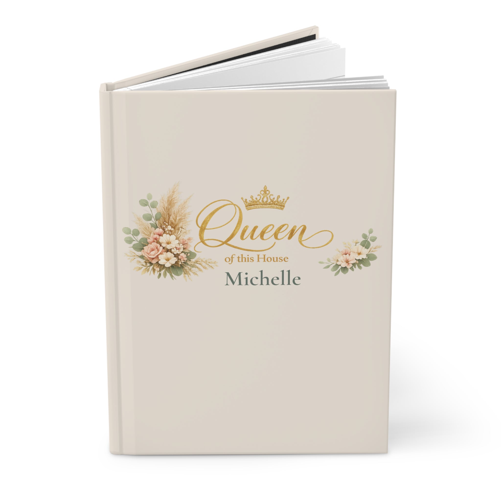 Close-up of the Queen of This House journal cover showing gold crown detail and personalized name