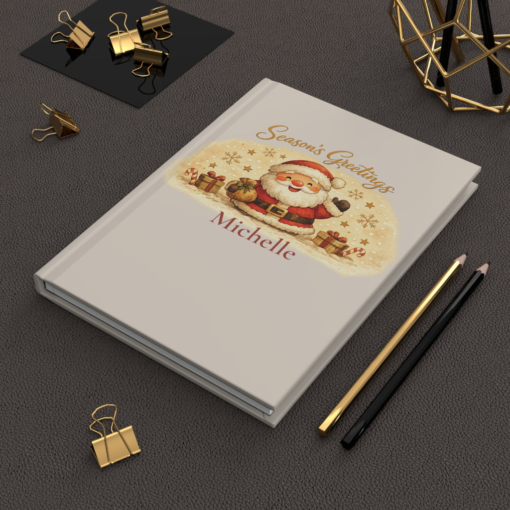 Season's Greetings journal held in hand to show size and portability