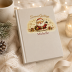 Closed Season's Greetings hardcover journal standing upright showing the spine