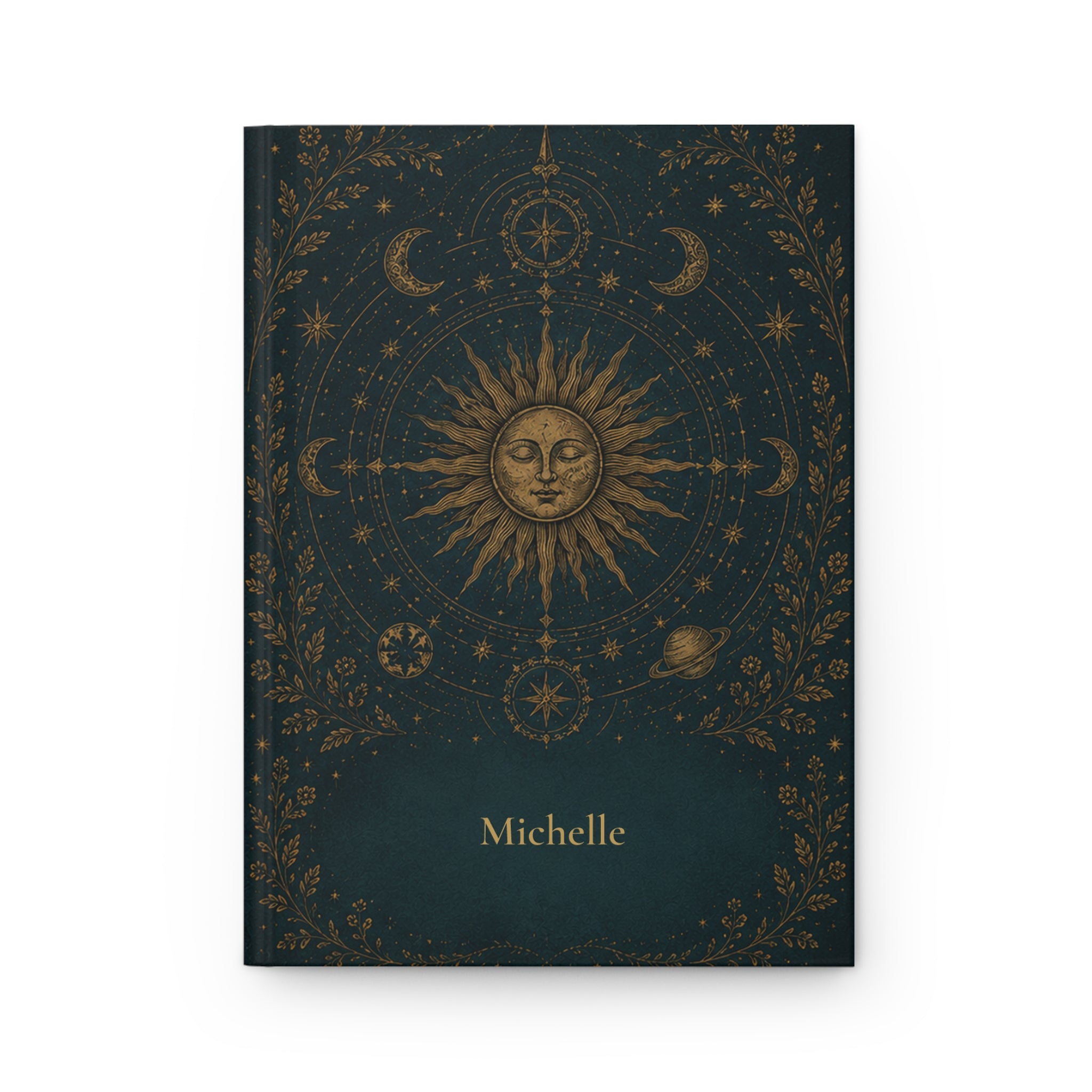 Sun and Moon personalized journal open flat showing custom name on dark teal cover with gold celestial illustration