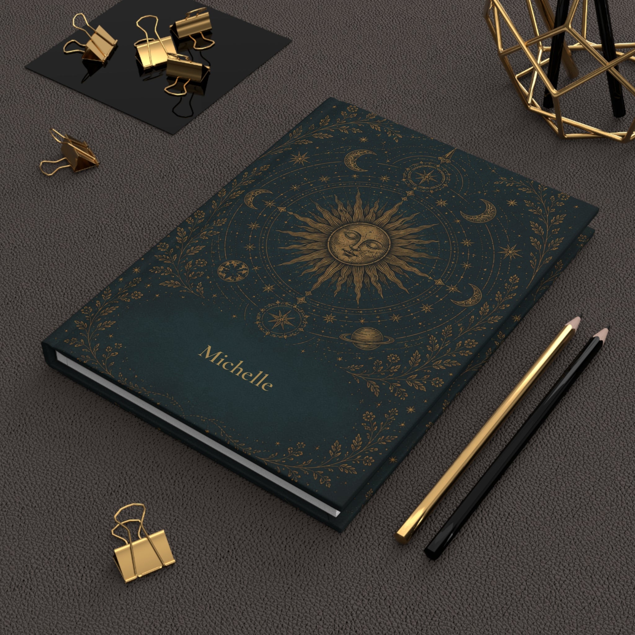 Sun and Moon journal held in hand to show size and portability