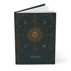 Close-up of the Sun and Moon journal cover showing gold sun illustration and personalized name