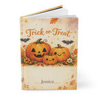 Close-up of the Trick or Treat journal cover showing pumpkin illustration and personalized name