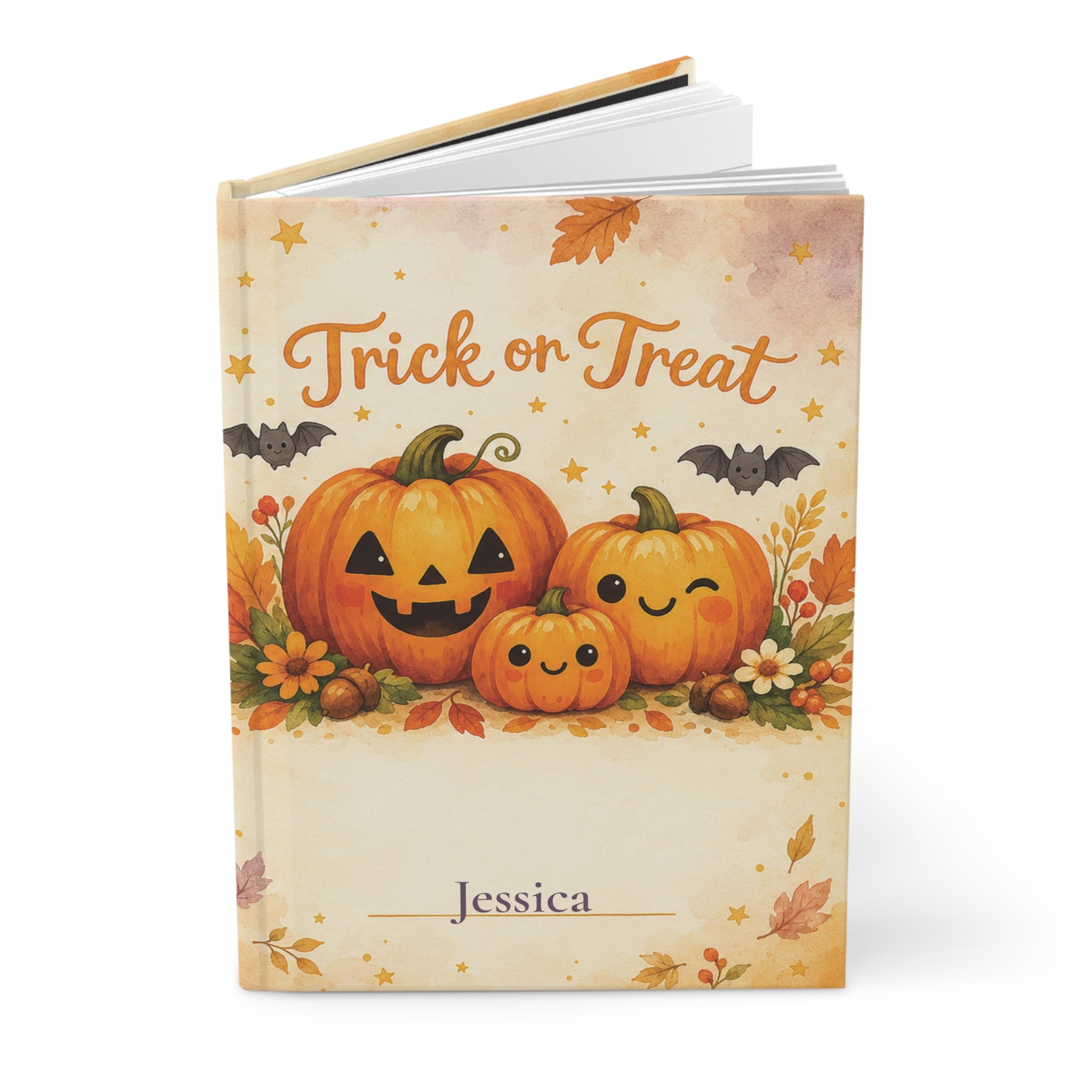 Close-up of the Trick or Treat journal cover showing pumpkin illustration and personalized name
