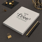 Wild & Free journal held in hand to show size and portability