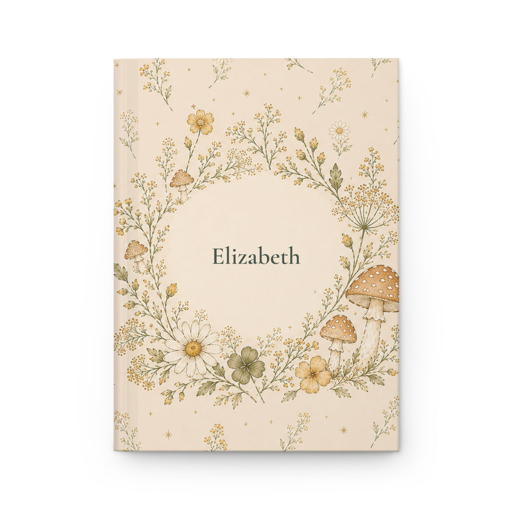 Wildflower and Mushroom personalized journal open flat showing custom name on cover with floral wreath illustration