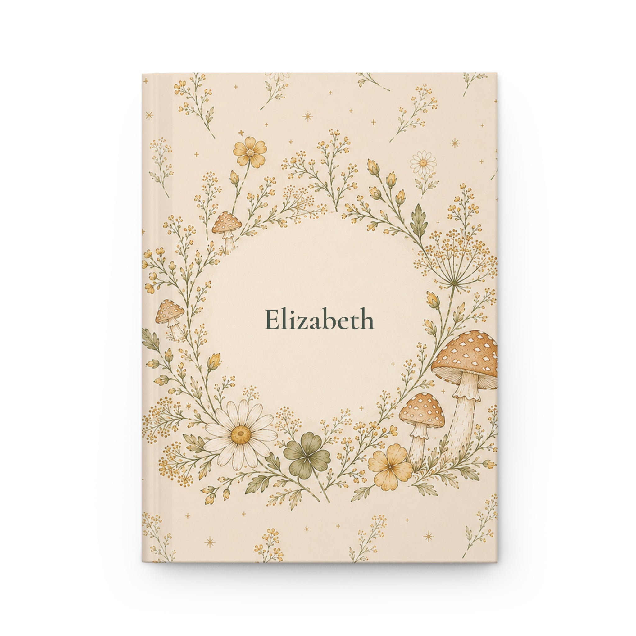 Wildflower and Mushroom personalized journal open flat showing custom name on cover with floral wreath illustration