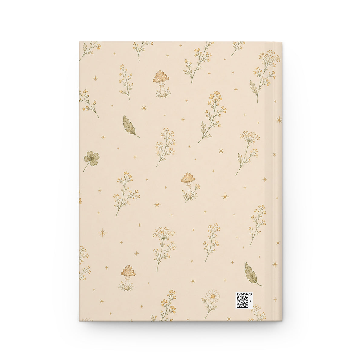 Wildflower and Mushroom journal styled on a wooden desk with coffee and pen, flat lay